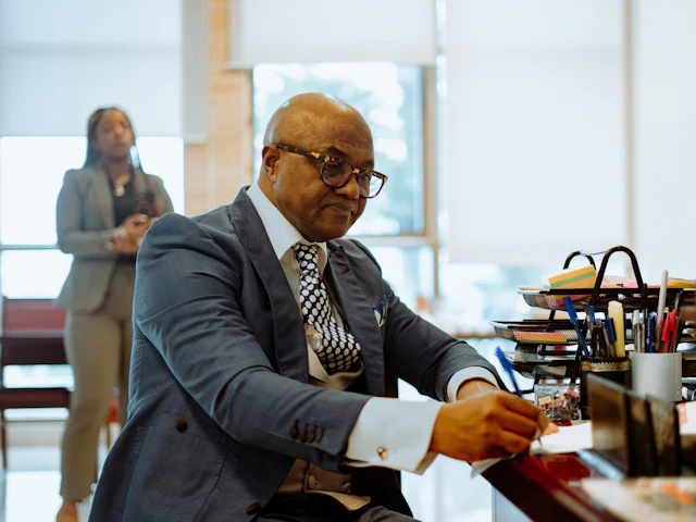 An attorney working at his desk in a law office